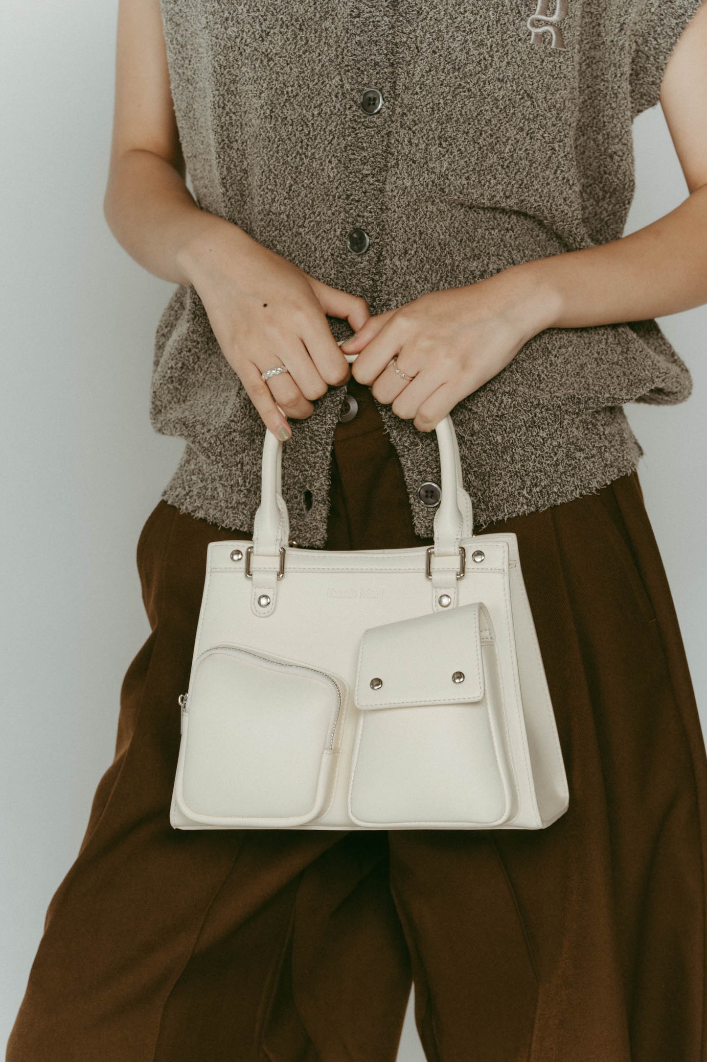 multi pocket hand bag/2color