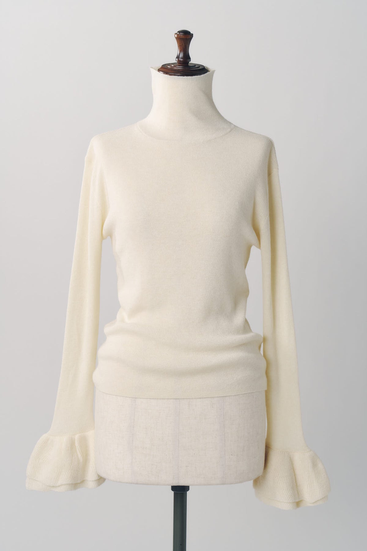 frill high neck knit/ivory
