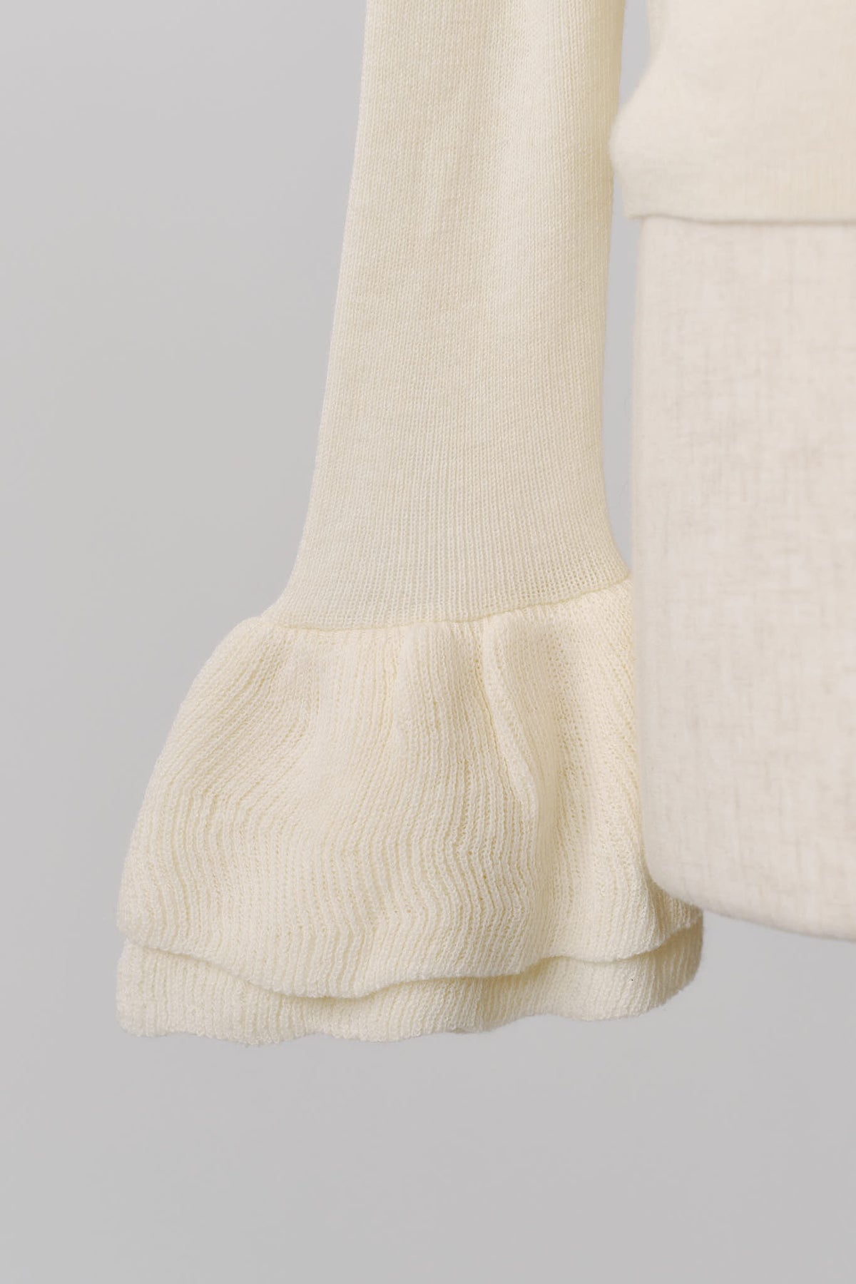 frill high neck knit/ivory
