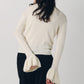 frill high neck knit/ivory