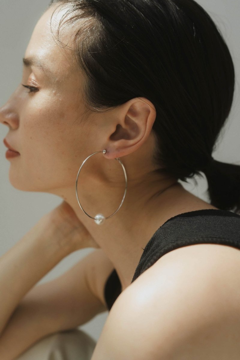 Knuth Marf metal design pierced earrings